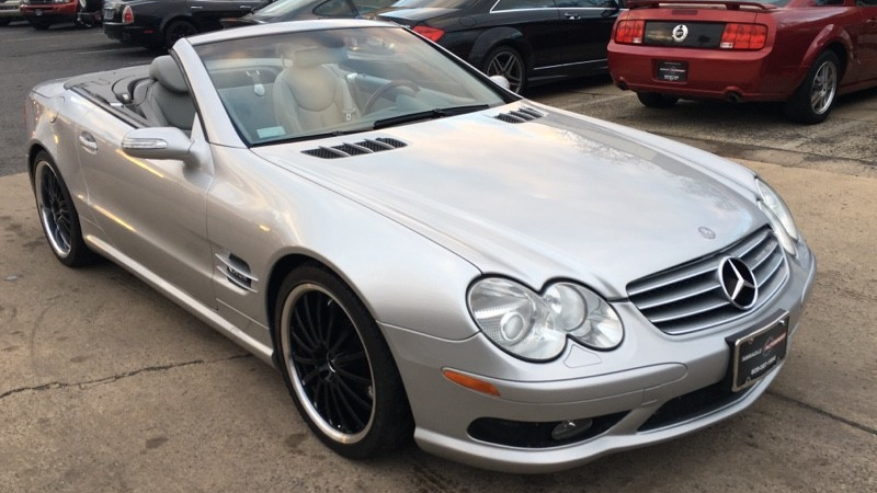 Illustration for article titled Why The Hell Would You Buy A Mazda Miata When This V12 Mercedes Is Way Cheaper?Â